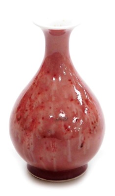 A Chinese sang de boeuf porcelain vase, of baluster form, with an uneven colour, Kangxi six character mark but later, 12.5cm high. - 5