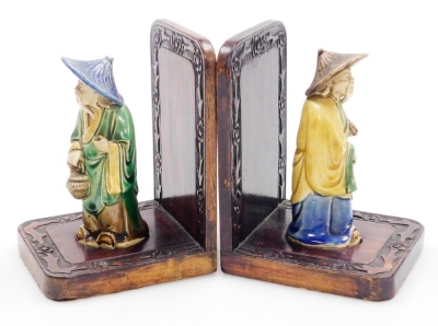 A pair of Chinese hardwood bookends, set with mudman figures and a carved floral border, 16cm high. - 7