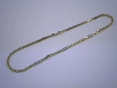 A fancy link bi-colour neckchain with triple tiny diamond set inserts