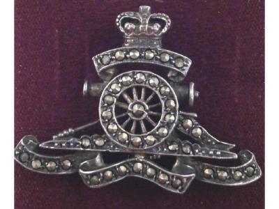 A Royal Artillery lapel badge marked 925s