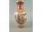 A modern Chinese baluster shaped vase decorated with figures within pink