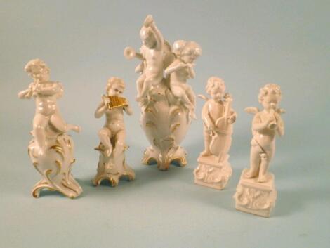 Various Italian porcelain figures of putti playing musical instruments