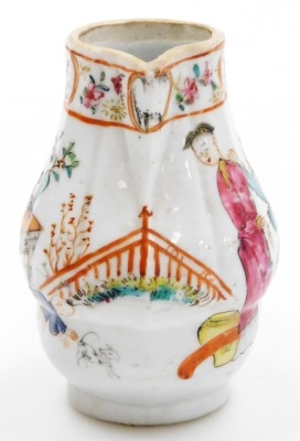 An 18thC Chinese export porcelain sparrow beak jug, painted in coloured enamels of figures on a garden terrace, 9.5cm high. - 2