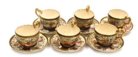 A set of six Satsuma pottery teacups and saucers, each with a gilt highlighted moulded chilin handles painted Kinkozan mark to saucer bases, teacup 7cm high. Note: the mark is not that of the famous Kinkozan factory in Kyoto but another business as the f