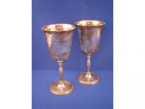 A pair of silver goblets