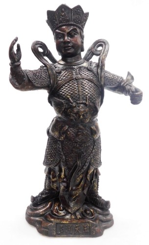 A painted cast iron figure of an ancient Chinese General, possibly the King of Fortune, gilt highlights, 63cm high. 