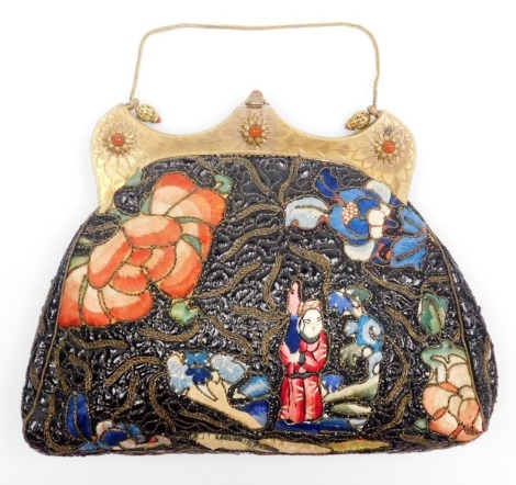 An early 20thC French handbag in the Chinese style, with a bright cut decorated shaped top clasp embellished with orange stone set raised flowers, the body embroidered to the front with a figure amongst flowers, verso with a vase surrounded by flowers, 18