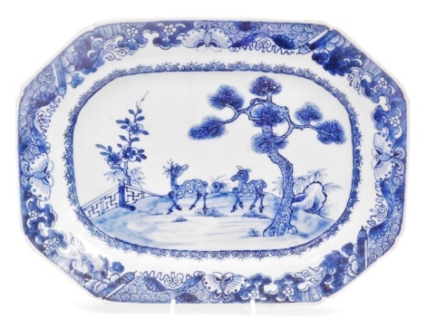 A late 18thC Chinese export porcelain blue and white meat platter, of rectangular form, decorated centrally with deer in a garden, within a border of butterflies, scrolls, and flowers, 31.5cm wide.