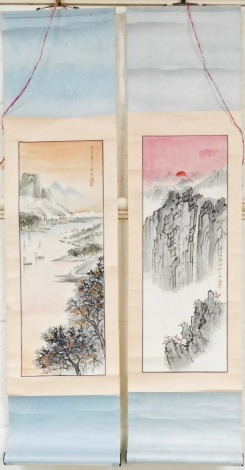 A pair of 20thC Chinese scroll watercolours, one depicting a riverscape, with mountains in the background tress to the foreground, the other with a craggy mountainside with a pagoda atop steep steps, bears seal mark, 49.5cm x 17.5cm.