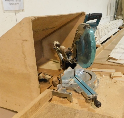 Wooden workbenches to house a saw (saw not included)