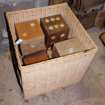 A group of hardwood decorative dice, with mother of pearl inlay. Note: VAT is payable on the hammer price of this lot at 20%.