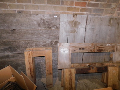 Three reclaimed hardwood plank top occasional tables, of differing sizes, unassembled. Note: VAT is payable on the hammer price of this lot at 20%.