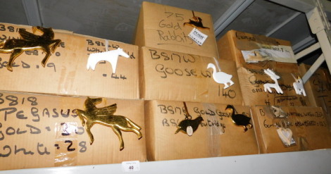 A quantity of painted carved wooden hanging decorations, to include white geese, gold coloured rabbits, unpainted open hearts, gold coloured Pegasus, etc. (8 boxes) Note: VAT is payable on the hammer price of this lot at 20%.