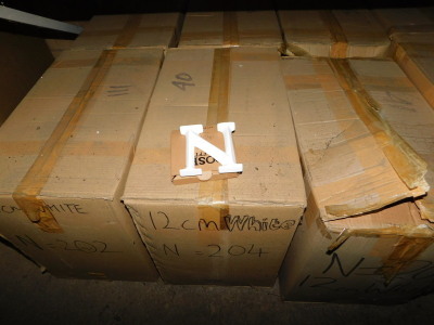 A group of white coloured carved wooden letters, to include N, each 12cm high. (6 boxes) Note: VAT is payable on the hammer price of this lot at 20%.