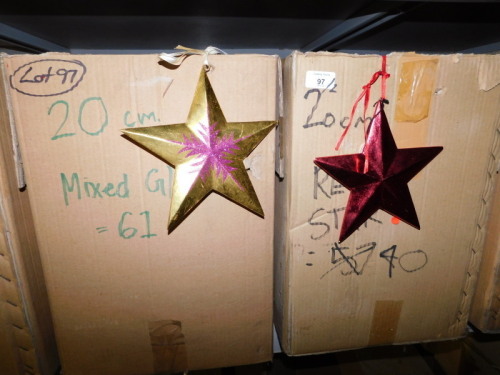 A group of painted wooden star hanging decorations, to include mix glitter, and red glitter etc., each 20cm high. (2 boxes) Note: VAT is payable on the hammer price of this lot at 20%.