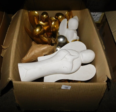 A group of painted carved wooden angels, in gold, silver, and white coloured paint, each 45cm high. Note: VAT is payable on the hammer price of this lot at 20%.