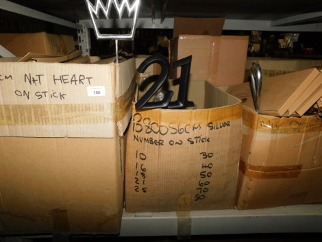 A group of painted wooden decorations on sticks, to include numbers, 10, 30, 40, crowns, hearts, etc. (3 boxes) Note: VAT is payable on the hammer price of this lot at 20%.