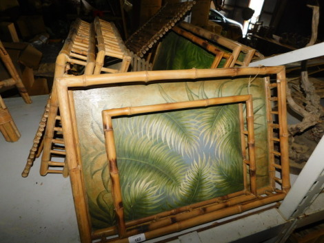 A quantity of bamboo framed trays, etc., each with central hand painted leaf decoration, etc. Note: VAT is payable on the hammer price of this lot at 20%.