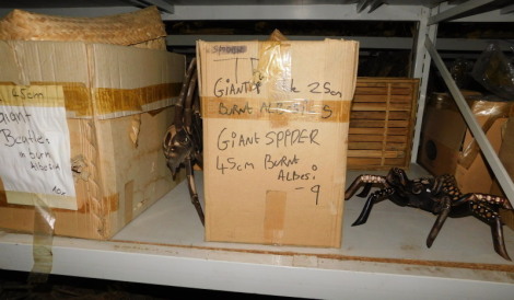 A quantity of painted wooden articulated spiders, beetles, etc., each approx 42cm wide. (2 boxes) Note: VAT is payable on the hammer price of this lot at 20%.