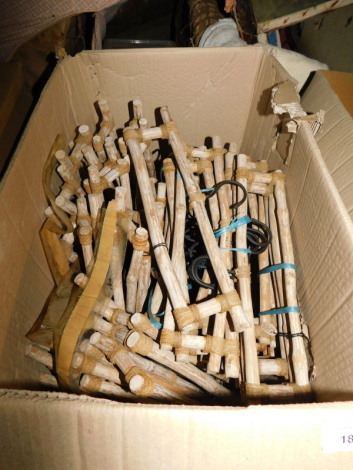 Two boxes of wooden child's coat hangers, each 40cm wide. Note: VAT is payable on the hammer price of this lot at 20%.