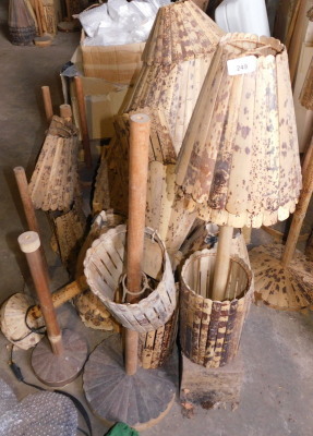 A large quantity of tiger bamboo light shades, table lamp bases, etc., various styles. Note: VAT is payable on the hammer price of this lot at 20%.