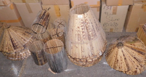 A quantity of tiger bamboo light shades, various sizes and styles. Note: VAT is payable on the hammer price of this lot at 20%.