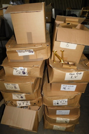 A group of gold coloured carved wooden letters, to include L, V, X, N, each 12cm high. (a quantity) Note: VAT is payable on the hammer price of this lot at 20%.