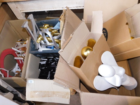 A group of painted wooden angel figures, in gold and white, 45cm high, painted letters, etc. (3 boxes) Note: VAT is payable on the hammer price of this lot at 20%.