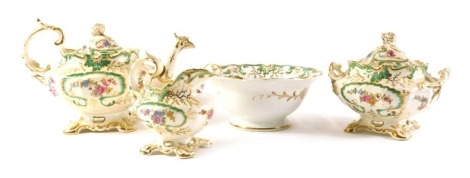 A 19thC English porcelain four piece tea service, decorated with rococo scrolls and transfer printed in floral flowers, unmarked, possibly Ridgway or Daniel. (AF)