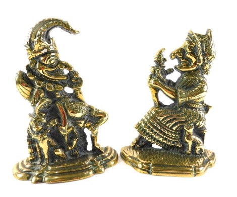 A pair of Victorian brass doorstops, Punch and Judy, 28cm high.