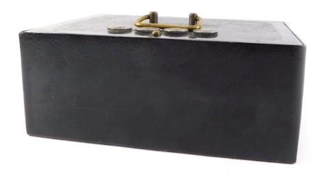 A Sermos strong box with combination, painted in black with brass handle, 30cm wide.