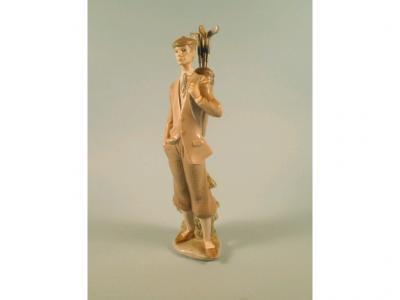 A Lladro figure of a golfer