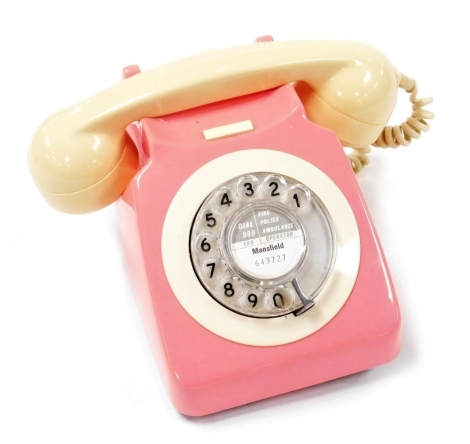 A bicolour GPO dial telephone, in pink and cream, 745GNA80/2, number for Mansfield 649727.