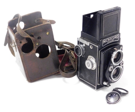 A Micro Precision Products Microcord twin lens reflex camera, with two Ross of London lenses, cased. 