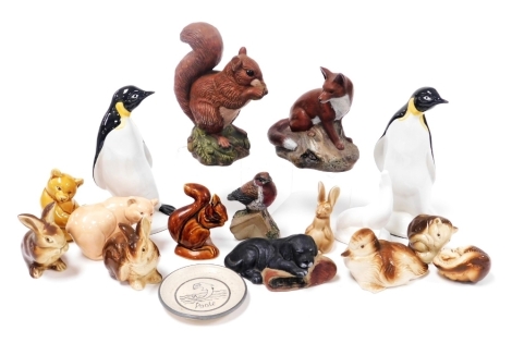 A pair of Poole pottery figures of penguins, together with further glazed and matte figures of animals and birds, and a Purbeck Pottery Poole dish. (a quantity)