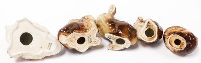 A pair of Poole pottery figures of penguins, together with further glazed and matte figures of animals and birds, and a Purbeck Pottery Poole dish. (a quantity) - 9