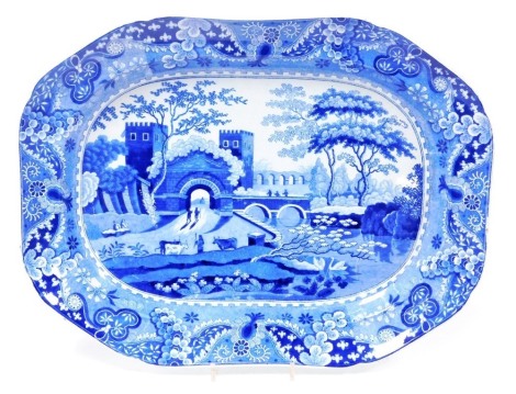 An early 19thC Spode blue and white meat platter decorated in the Bridge of Lucano pattern, 48cm wide.