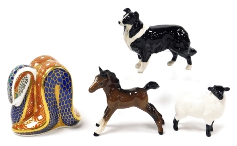 A Royal Crown Derby Imari paperweight modelled a snake, second, silver stopper, together with three Beswick figures modelled as a collie, sheep, and a brown gloss foal. (4)