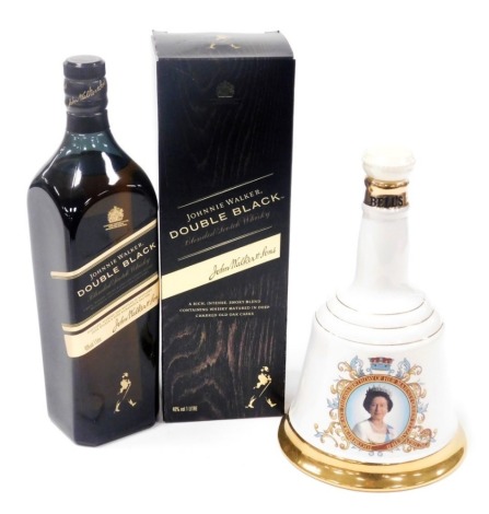 A bottle of Johnny Walker double black blended Scotch whisky, boxed, together with a Bells Scotch whisky decanter, of bell form, commemorating the 60th birthday of Her Late Majesty Queen Elizabeth II. (2)