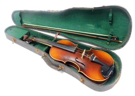 A violin and bow, cased.