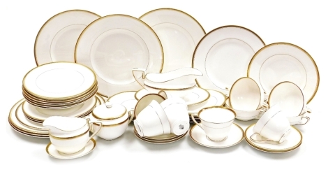 A Royal Worcester Viceroy pattern porcelain part dinner and tea service, comprising gravy boat on stand, six dinner and four dessert plates, six fruit bowls, four soup cups and saucers, cream jug, sucrier, six teacups, pair of bread plates, etc. (a quanti