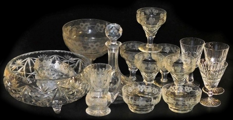 A group of cut glass, to include an Edinburgh Crystal water jug engraved with thistles, six wine coupes engraved with vines, four fruit or finger bowls, a comport and a ship's decanter and stopper.