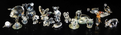 Swarovski crystal figures, some with containers, including a butterfly, duck, koala, teddy bears, cat, owl, and a fox. (a quantity)