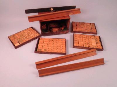 A bamboo Mahjong set in a mahogany case