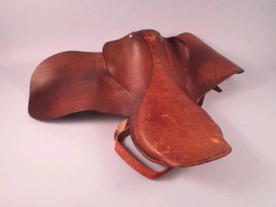 A leather saddle 45cm deep