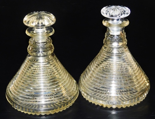 A pair of 19thC cut glass ship's decanters, of banded form, with stoppers, 22cm high.