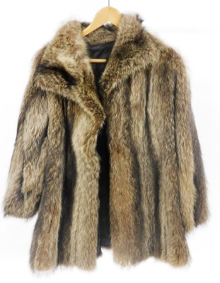 A lady's fox fur coat, under arm measurement 47cm wide.