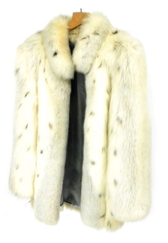 A lady's Arctic fox fur coat, under arm measurement 47cm wide.