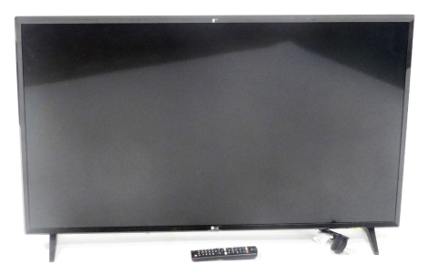 An LG 43" flat screen television, 43UJ6230V, with remote.