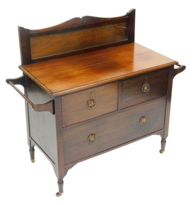 A late Victorian mahogany wash stand, with a glass inset back splash, two towel rails, with two short over one long drawer, raised on turned legs, brass capped on castors, 100cm high, 111cm wide, 49cm deep.